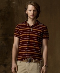 Putting a downtown spin on a preppy style icon, this short-sleeved polo in cotton jersey channels a rugged, tribal feel with rustic batik stripes. Putting a downtown spin on a preppy style icon, this short-sleeved polo in cotton jersey channels a rugged, tribal feel with rustic batik stripes.