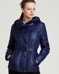 Andrew Marc's flat taffeta down coat boasts a luxe finish on a figure-flattering, belted silhouette. A seatbelt style belt adds a hint of modern edge. Andrew Marc's flat taffeta down coat boasts a luxe finish on a figure-flattering, belted silhouette. A seatbelt style belt adds a hint of modern edge.