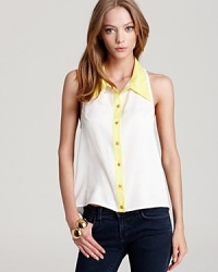 Structure meets relaxed fit in this Aqua top. The collar dresses up the silhouette while the loose body and high/low hem make for a loose and languid style. Structure meets relaxed fit in this Aqua top. The collar dresses up the silhouette while the loose body and high/low hem make for a loose and languid style.