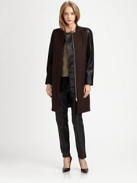 Contrasting faux leather sleeves add a colorblock effect to this wool-rich, A-line jacket. RoundneckLong faux leather sleevesHidden button frontSlash pocketsFully linedAbout 36 from shoulder to hem80% wool/20% nylonDry cleanImportedModel shown is 5'10 (177cm) wearing US size 0. Contrasting faux leather sleeves add a colorblock effect to this wool-rich, A-line jacket. RoundneckLong faux leather sleevesHidden button frontSlash pocketsFully linedAbout 36 from shoulder to hem80% wool/20% nylonDry cleanImportedModel shown is 5'10 (177cm) wearing US size 0.