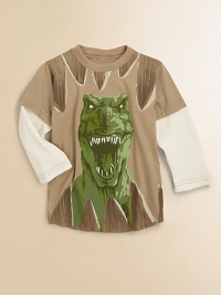 Open wide but stay out of the way of this menacing dinosaur who looks ready to pounce on a tee with layered-look waffle sleeves.Ribbed crewneck with tooth designLong sleeves with a layered waffle textureFront screened design, including more teeth at the hem50% cotton/50% polyester; cotton sleevesMachine washMade in USA of imported fabric Open wide but stay out of the way of this menacing dinosaur who looks ready to pounce on a tee with layered-look waffle sleeves.Ribbed crewneck with tooth designLong sleeves with a layered waffle textureFront screened design, including more teeth at the hem50% cotton/50% polyester; cotton sleevesMachine washMade in USA of imported fabric