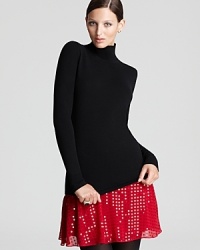 True to fall's minimalist aesthetic, this cashmere DKNY turtleneck flaunts an understated silhouette and clean lines for everyday chic. True to fall's minimalist aesthetic, this cashmere DKNY turtleneck flaunts an understated silhouette and clean lines for everyday chic.