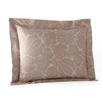 Egyptian cotton is woven in Italy into a serene and sweet sateen jacquard. Large scrolls play across the shining surface of the duvet covers and shams, each finished with a plain hem and decorated with a subtle flange. The duvet covers are backed in a plain sateen while the shams feature the jacquard pattern on the front and back. Egyptian cotton is woven in Italy into a serene and sweet sateen jacquard. Large scrolls play across the shining surface of the duvet covers and shams, each finished with a plain hem and decorated with a subtle flange. The duvet covers are backed in a plain sateen while the shams feature the jacquard pattern on the front and back.