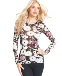 Go for winter florals with this BCBGMAXAZRIA top, perfect for adding a pop of print to your cold-weather look! Go for winter florals with this BCBGMAXAZRIA top, perfect for adding a pop of print to your cold-weather look!