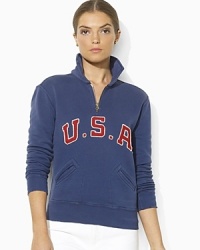 A half-zip mockneck pullover is crafted from ultra-soft fleece, gently washed with applied country patchwork at the front, celebrating Team USA's participation in the 2012 Olympics. A half-zip mockneck pullover is crafted from ultra-soft fleece, gently washed with applied country patchwork at the front, celebrating Team USA's participation in the 2012 Olympics.
