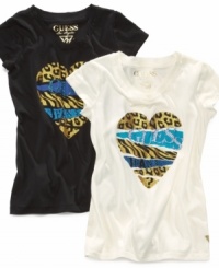 Perfect for the fashionable set who love their cotton tees. She'll be living in her graphic heart t-shirt from Guess day in and day out. Perfect for the fashionable set who love their cotton tees. She'll be living in her graphic heart t-shirt from Guess day in and day out.