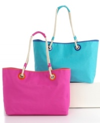 Life's a beach! Fit everything you need for a fun day at the beach in this stylish canvas beach tote from Martha Stewart Collection. Comes in bright colors and features a fun print on the inside. Life's a beach! Fit everything you need for a fun day at the beach in this stylish canvas beach tote from Martha Stewart Collection. Comes in bright colors and features a fun print on the inside.