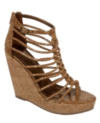 Metallic, strappy, and caged, the Caravan wedges by Carlos by Carlos Santana are not for the feint of heart. Metallic, strappy, and caged, the Caravan wedges by Carlos by Carlos Santana are not for the feint of heart.