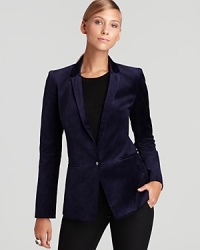 Plush velvet lends a trend-right look to a structured, fitted Elie Tahari blazer. Plush velvet lends a trend-right look to a structured, fitted Elie Tahari blazer.