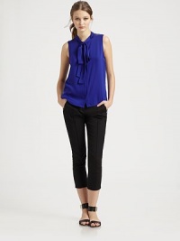 Slim cropped pants are complemented with sharp tailoring in this simply elegant design. Narrow waistband with belt loopsZip fly with button closureDual side zipper slash pocketsSeaming detailsBack flap pocketsInseam, about 24¾Rise, about 952% cotton/44% polyester/4% spandexDry cleanImportedModel shown is 5'9½ (176cm) wearing US size 4. Slim cropped pants are complemented with sharp tailoring in this simply elegant design. Narrow waistband with belt loopsZip fly with button closureDual side zipper slash pocketsSeaming detailsBack flap pocketsInseam, about 24¾Rise, about 952% cotton/44% polyester/4% spandexDry cleanImportedModel shown is 5'9½ (176cm) wearing US size 4.