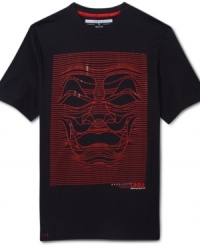 A uniquely awesome wave and face graphic covers the front of this cozy Sean John tee. A uniquely awesome wave and face graphic covers the front of this cozy Sean John tee.