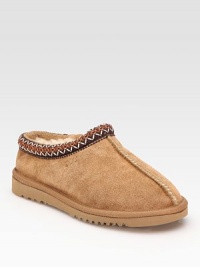 Stay cozy in a this classic suede style with plush shearling lining and embroidered details. Stretch suede upper Shearling lining Foam sole Padded insole Imported Stay cozy in a this classic suede style with plush shearling lining and embroidered details. Stretch suede upper Shearling lining Foam sole Padded insole Imported