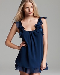 Ruffled in all the right places, Flora Nikrooz' flowy chemise and matching thong are a beautiful pair. Ruffled in all the right places, Flora Nikrooz' flowy chemise and matching thong are a beautiful pair.