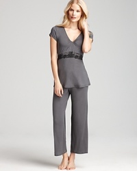 With lace detailing and a ruched neckline, this Josie set is a feminine take on basic lounge wear. With lace detailing and a ruched neckline, this Josie set is a feminine take on basic lounge wear.