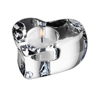 Designer Martti Rytkönen crafts this votive with nothing less than love, offering a uniquely shaped heart in dazzling glass for an enduring, special gift. Designer Martti Rytkönen crafts this votive with nothing less than love, offering a uniquely shaped heart in dazzling glass for an enduring, special gift.