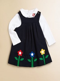 A beautiful, girly jumper/dress blooming with colorful floral appliqués and a pretty pleated bodice.SquareneckShoulder straps with button closureEmpire waistPleated bodice65% polyester/35% cottonMachine washImported Please note: Number of buttons may vary depending on size ordered. A beautiful, girly jumper/dress blooming with colorful floral appliqués and a pretty pleated bodice.SquareneckShoulder straps with button closureEmpire waistPleated bodice65% polyester/35% cottonMachine washImported Please note: Number of buttons may vary depending on size ordered.