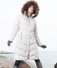 Calvin Klein's knee-length puffer coat features a down-blend fill for heavyweight warmth, while a faux-fur-trimmed hood adds a luxe touch. Calvin Klein's knee-length puffer coat features a down-blend fill for heavyweight warmth, while a faux-fur-trimmed hood adds a luxe touch.
