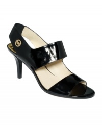 Keep a high-style low profile. The Rochelle pumps by MICHAEL Michael Kors have thick patent straps and a gold designer logo at the ankle. Keep a high-style low profile. The Rochelle pumps by MICHAEL Michael Kors have thick patent straps and a gold designer logo at the ankle.