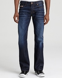 The Diesel Zatiny jean brings authentic styling and classic character to your look with fading on the front, tailored for a fine bootcut silhouette. The Diesel Zatiny jean brings authentic styling and classic character to your look with fading on the front, tailored for a fine bootcut silhouette.