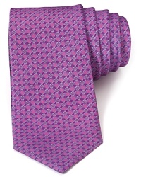 Luxuriously soft silk with an allover chain link pattern is cut in a traditional width for a special addition to your work wardrobe. Luxuriously soft silk with an allover chain link pattern is cut in a traditional width for a special addition to your work wardrobe.