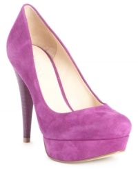 High rise: A stacked heel adds height--and style!--to GUESS' Adriena2 platform pumps. They're a perennially practical and stylish addition to your workday wardrobe. High rise: A stacked heel adds height--and style!--to GUESS' Adriena2 platform pumps. They're a perennially practical and stylish addition to your workday wardrobe.