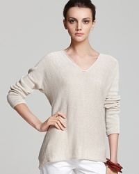 Lightweight linen meets slouchy-cool in this Vince sweater that features a double v neckline and comfy, oversize fit. Lightweight linen meets slouchy-cool in this Vince sweater that features a double v neckline and comfy, oversize fit.