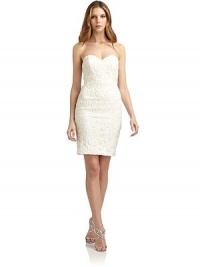 THE LOOKStraplessSweetheart necklineBoning at bodiceAllover floral lace detailConcealed back zip with hook-and-eye closureTHE FITAbout 23 from natural waistTHE MATERIAL97% silk/3% spandexFully linedCARE & ORIGINDry cleanImportedModel shown is 5'10 (177cm) wearing US size 4. THE LOOKStraplessSweetheart necklineBoning at bodiceAllover floral lace detailConcealed back zip with hook-and-eye closureTHE FITAbout 23 from natural waistTHE MATERIAL97% silk/3% spandexFully linedCARE & ORIGINDry cleanImportedModel shown is 5'10 (177cm) wearing US size 4.