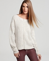 Rendered in a soft wool blend, this Line sweater is puckered on back with front seaming details for added texture and shape. Rendered in a soft wool blend, this Line sweater is puckered on back with front seaming details for added texture and shape.