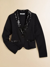 A classic blazer gets a fun twist with stylish sequin details. Sequin lapelFront button closureLong sleevesSequin mock pocketsCotton/polyester/spandexMachine washImported A classic blazer gets a fun twist with stylish sequin details. Sequin lapelFront button closureLong sleevesSequin mock pocketsCotton/polyester/spandexMachine washImported