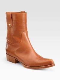 Side pull tabs, intricate stitching and a stacked heel characterize this rich, Italian leather ankle boot. Stacked heel, 1 (25mm)Leather upperPull-on styleLeather lining and solePadded insoleMade in ItalyOUR FIT MODEL RECOMMENDS ordering one size up as this style runs small. Side pull tabs, intricate stitching and a stacked heel characterize this rich, Italian leather ankle boot. Stacked heel, 1 (25mm)Leather upperPull-on styleLeather lining and solePadded insoleMade in ItalyOUR FIT MODEL RECOMMENDS ordering one size up as this style runs small.
