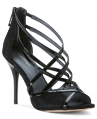 The epitome of sexy. Calvin Klein's Sirey strappy evening sandals will add dimension to your night out. The epitome of sexy. Calvin Klein's Sirey strappy evening sandals will add dimension to your night out.