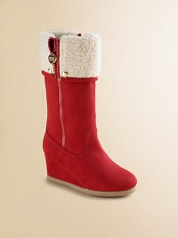 Velvety faux suede on a covered wedge heel, topped by a cuddly faux shearling cuff.> Faux suede upperOutside zipper with stud accentsCovered wedgeFaux shearling liningPadded insoleRubber composite soleImported Velvety faux suede on a covered wedge heel, topped by a cuddly faux shearling cuff.> Faux suede upperOutside zipper with stud accentsCovered wedgeFaux shearling liningPadded insoleRubber composite soleImported