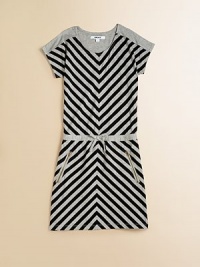 Diagonal stripes and zippers embellish this alluring frock in a lightweight cotton blend with contrasting solid back.ScoopneckShort sleevesPullover styleElastic waist with bow detailFront zipper pockets60% cotton/40% rayonMachine washImported Diagonal stripes and zippers embellish this alluring frock in a lightweight cotton blend with contrasting solid back.ScoopneckShort sleevesPullover styleElastic waist with bow detailFront zipper pockets60% cotton/40% rayonMachine washImported