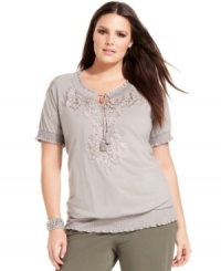Look casually chic this season with INC's plus size peasant top, finished by charming applique. Look casually chic this season with INC's plus size peasant top, finished by charming applique.