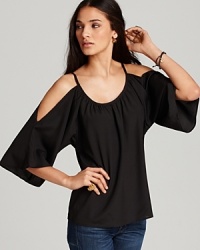 Boasting cutout shoulders and a billowy silhouette, this Vintage Havana top ticks all the right style boxes for a fashion-forward summer. Boasting cutout shoulders and a billowy silhouette, this Vintage Havana top ticks all the right style boxes for a fashion-forward summer.