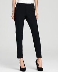 Sleek, slim and anything but basic, these little black pants are the go-to look that looks great with everything. Sleek, slim and anything but basic, these little black pants are the go-to look that looks great with everything.