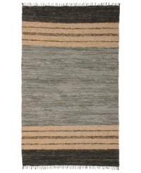 Olé! Spice up your decor with the gorgeously festive style of the Matador rug from St. Croix. Durable leather strips in elegant grey and cream hues are meticulously hand woven with fine cotton strands, resulting in a beautiful, rustic texture and natural braided pattern that accents even the most eclectic decor. Olé! Spice up your decor with the gorgeously festive style of the Matador rug from St. Croix. Durable leather strips in elegant grey and cream hues are meticulously hand woven with fine cotton strands, resulting in a beautiful, rustic texture and natural braided pattern that accents even the most eclectic decor.