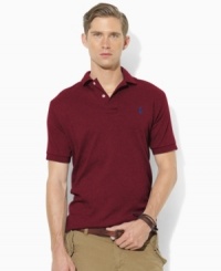 An iconic short-sleeved polo shirt is cut for a classic fit in smooth, soft cotton interlock. An iconic short-sleeved polo shirt is cut for a classic fit in smooth, soft cotton interlock.