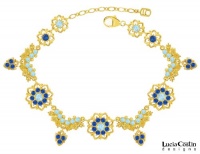 European Style 24K Yellow Gold Plated over .925 Sterling Silver Flower Bracelet by Lucia Costin with Light Blue and Blue Swarovski Crystals, Set with Leaves and Fancy Charms European Style 24K Yellow Gold Plated over .925 Sterling Silver Flower Bracelet by Lucia Costin with Light Blue and Blue Swarovski Crystals, Set with Leaves and Fancy Charms