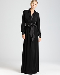 Exude timeless glamour in this floor-skimming Rachel Zoe tuxedo wrap dress. A satin sash finishes the look. Exude timeless glamour in this floor-skimming Rachel Zoe tuxedo wrap dress. A satin sash finishes the look.