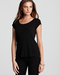 A classic tee, given a luxurious update in luxurious pure silk. Team this Eileen Fisher creation with dark denim and pointed pumps for day. A classic tee, given a luxurious update in luxurious pure silk. Team this Eileen Fisher creation with dark denim and pointed pumps for day.