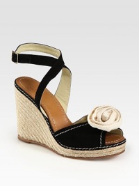 Adjustable suede straps and a canvas rosette update this traditional espadrille wedge. Hemp wedge, 4 (100mm)Hemp platform, 1 (25mm)Compares to a 3 heel (75mm)Canvas and suede upperLeather lining and soleImportedOUR FIT MODEL RECOMMENDS ordering true size. Adjustable suede straps and a canvas rosette update this traditional espadrille wedge. Hemp wedge, 4 (100mm)Hemp platform, 1 (25mm)Compares to a 3 heel (75mm)Canvas and suede upperLeather lining and soleImportedOUR FIT MODEL RECOMMENDS ordering true size.