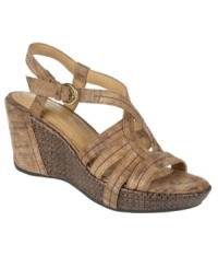 Get back to nature. Earthy hues and finishes create a beautiful effect on the comfortable Naza wedge sandals by Naturalizer. Get back to nature. Earthy hues and finishes create a beautiful effect on the comfortable Naza wedge sandals by Naturalizer.