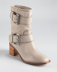 Boutique 9's Blaine boots show off a versatile, utilitarian look in smooth leather, with oversized buckle straps and chunky hardware. Boutique 9's Blaine boots show off a versatile, utilitarian look in smooth leather, with oversized buckle straps and chunky hardware.
