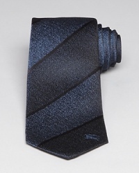 Burberry London offers another exceptional tie for the modern professional, patterning thick bands of color with the equestrian knight logo at the bottom left edge for signature designer appeal. Burberry London offers another exceptional tie for the modern professional, patterning thick bands of color with the equestrian knight logo at the bottom left edge for signature designer appeal.