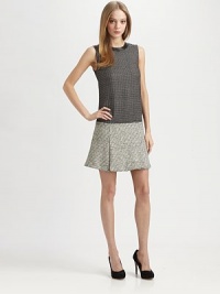 Styled with an abstract dash print, this two-tone, silk-rich silhouette has a faux-leather collar, drop waist and pleated skirt. Faux-leather trimmed crewneckSleevelessInvisible back zipperAbout 17 from natural waist60% silk/40% viscoseDry cleanImportedModel shown is 5'9½ (176cm) wearing US size 2. Styled with an abstract dash print, this two-tone, silk-rich silhouette has a faux-leather collar, drop waist and pleated skirt. Faux-leather trimmed crewneckSleevelessInvisible back zipperAbout 17 from natural waist60% silk/40% viscoseDry cleanImportedModel shown is 5'9½ (176cm) wearing US size 2.