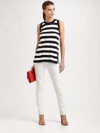 Styled with sailor-chic stripes, this ultra-soft tunic has side slits and an exposed back zipper. RoundneckSide slits at hemLonger length hits below the hipsExposed back zipper72% viscose/28% polyesterDry cleanImportedModel shown is 5'10 (177cm) wearing US size Small. Styled with sailor-chic stripes, this ultra-soft tunic has side slits and an exposed back zipper. RoundneckSide slits at hemLonger length hits below the hipsExposed back zipper72% viscose/28% polyesterDry cleanImportedModel shown is 5'10 (177cm) wearing US size Small.
