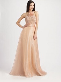 Airy organza, in a full-skirted, floor-length design crowned with a beaded bodice.Halter-style neckline with attached rosetteAllover beaded bodiceRuched waistbandCriss-crossed back strapsBack bowConcealed back zipFully linedAbout 45 from natural waistBodice: nylonSkirt: polyesterSpot cleanImported of Italian fabricModel shown is 5'9½ (176cm) wearing US size 4. Airy organza, in a full-skirted, floor-length design crowned with a beaded bodice.Halter-style neckline with attached rosetteAllover beaded bodiceRuched waistbandCriss-crossed back strapsBack bowConcealed back zipFully linedAbout 45 from natural waistBodice: nylonSkirt: polyesterSpot cleanImported of Italian fabricModel shown is 5'9½ (176cm) wearing US size 4.