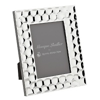 Atelier Metal Frames feature the elegant thumbprint design that brings modern texture to a classic design. This design will appeal to both feminine and masculine tastes making this the perfect collection for gifts or self-purchase. Atelier Metal Frames feature the elegant thumbprint design that brings modern texture to a classic design. This design will appeal to both feminine and masculine tastes making this the perfect collection for gifts or self-purchase.