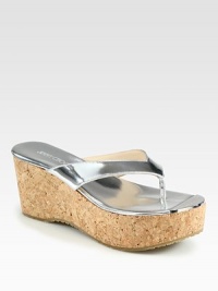 A cork wedge lifts this warm weather essential in lustrous metallic leather. Cork wedge, 3 (75mm)Cork platform, 1½ (40mm)Compares to a 1½ heel (40mm)Metallic leather upperMetallic leather liningRubber solePadded insoleMade in Italy A cork wedge lifts this warm weather essential in lustrous metallic leather. Cork wedge, 3 (75mm)Cork platform, 1½ (40mm)Compares to a 1½ heel (40mm)Metallic leather upperMetallic leather liningRubber solePadded insoleMade in Italy